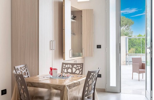 Boncore House | Monolocale Riva – Wi-Fi, Clima e Giardino a Torre Lapillo