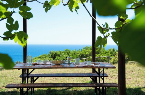 Roccamare Apartment | Myrtle Apartment, 4 beds. Private garden with sea view