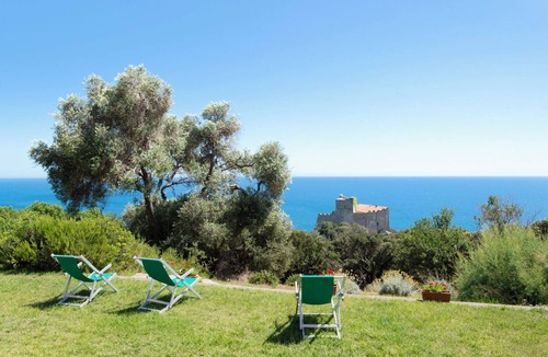 Roccamare Apartment | Myrtle Apartment, 4 beds. Private garden with sea view