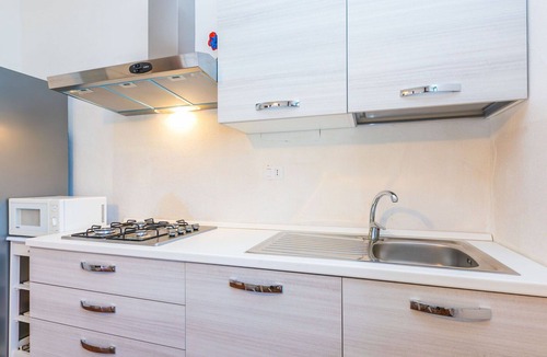 Follonica Villa | Nice apartment in villa for 12 guests with WIFI, private pool, TV, patio and pets allowed