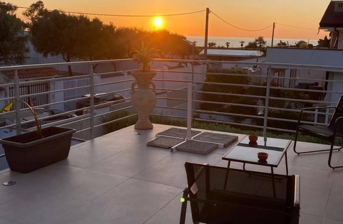 Palmi House | Palms by the sea - within walking distance of the beach.