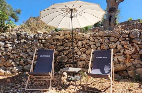 Marina San Gregorio Villa | Paradiso Pajare, a traditional Salento trullo designed with modern amenities.
