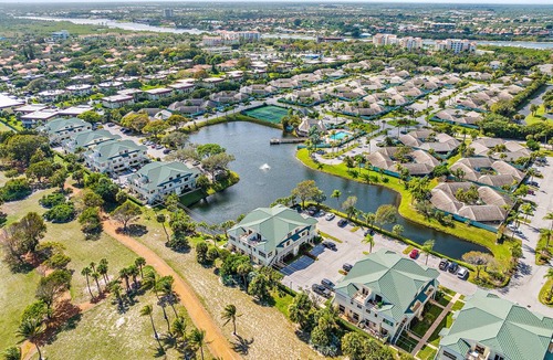 Bella Vista Condo | Practically on the beach; short walk across Carlin Park to the sand! ❤️💛💚