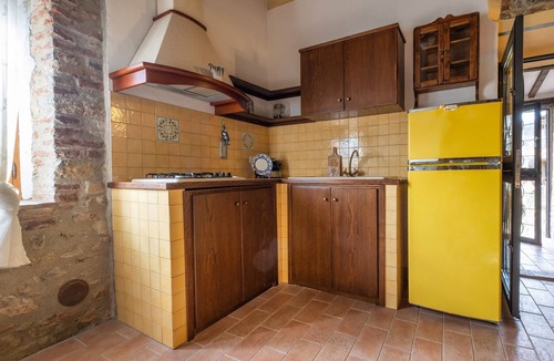 Castiglione della Pescaia Apartment | Reggia, in small medieval village characteristic apartment with fireplace