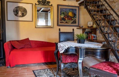 Castiglione della Pescaia Apartment | Reggia, in small medieval village characteristic apartment with fireplace