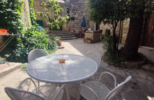 Erice House | Relaxing in a typical Erice courtyard