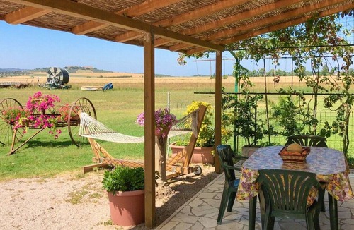 Grosseto Apartment | Room 'Camera Vicino Al Mare' with Balcony, Wi-Fi and Air Conditioning