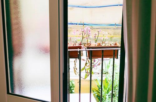 Monti House | Rooms Steps from Colosseum by Welcome In