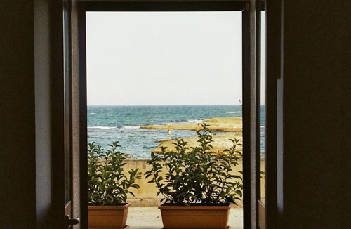 Villanova Apartment | Seafront apartment with terrace, veranda & interesting extras