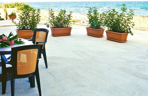 Villanova Apartment | Seafront apartment with terrace, veranda & interesting extras