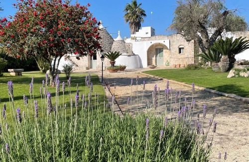 San Michele Salentino House | Splendid Apulian property with trullo, large swimming pool and orchard
