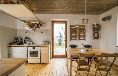 Montebuono House | Stone farmhouse among oaks in Maremma