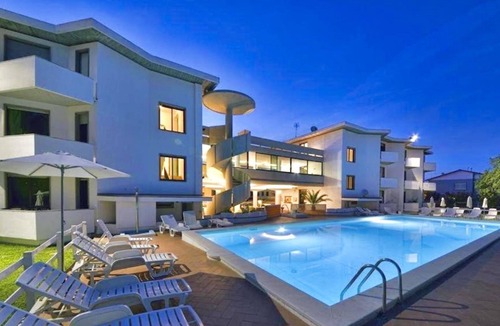 Marina di Cecina House | Studio apartment of approximately 20 m2 composed of a living room with kitchenette equipped with 2 induction hobs, small fridge, sink,satellite TV and sofa.Sleeping area separated by sliding door with double bed, bathroom with shower without window.Air c