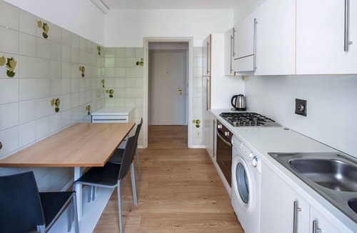 Santa Maria in Stelle Apartment | Stylish Lido Beach Apartment with Terrace, Shared Garden & Steps to the Sea
