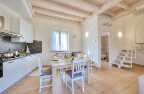 Arolo Apartment | Sunflower Terrace: Duplex for 4, Walk to Lake + Parking, Leggiuno, Italy
