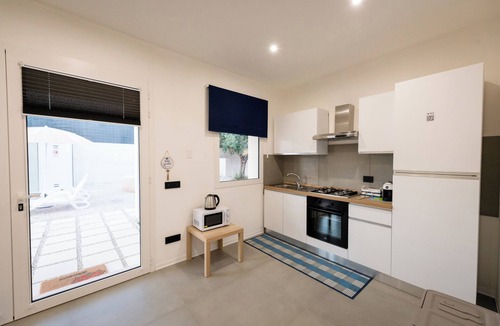 Scoglitti Apartment | The pool and Sicilian sunsets along the coast of Scoglitti.