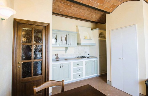 Castagneto Carducci Apartment | This 50 sq m apartment features a living room with a sofa and satellite TV, a fully equipped kitchenette, and a refrigerator.A double bedroom, a bedroom with two single beds, and a bathroom. Private parking is available.AIR CONDITIONING IS NOT AVAILABLE.