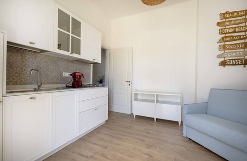 Monti D'arena-Bosco Caggione Apartment | This cozy apartment, perfect for two people, is located in a shared villa but has its own private access. It features a shared garden and a large furnished patio for exclusive use. The accommodation is located in Marina di Pulsano, a well-served seaside