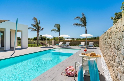Reitani Villa | Villa Calvo - Modern villa with pool near sea