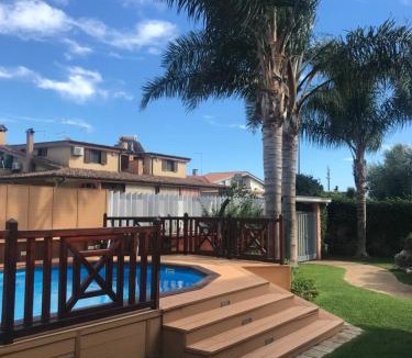 Ladispoli Villa | VILLA NEVADA Esclusiva con PISCINA Privata, Il Tuo Angolo di Pace a 5 Minuti dal MARE e 20 Minuti da ROMA