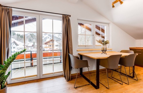 Unterjoch Apartment | VYLD: Eagle view mountain view and fireplace