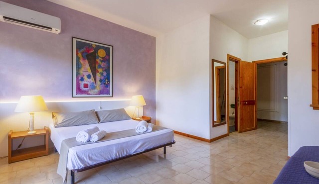 A cozy studio apartment with a balcony and kitchenette—perfect for two—located within the Campoverde Residence in Vernole, set in a Mediterranean pine forest between San Cataldo and the Le Cesine Nature Reserve. The property is just a short distance in Campo Verde