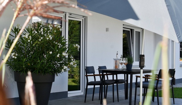Apartment 'Quartier Wellant' with Terrace, Garden, and View of Weißensberg Chapel in Weißensberg