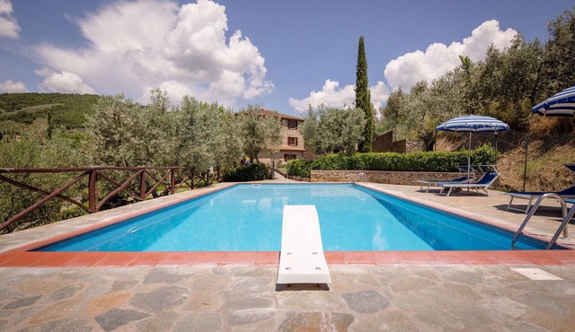 Beautiful apartment in villa with pool, A/C, WIFI, pets allowed and panoramic view, close to Cor.