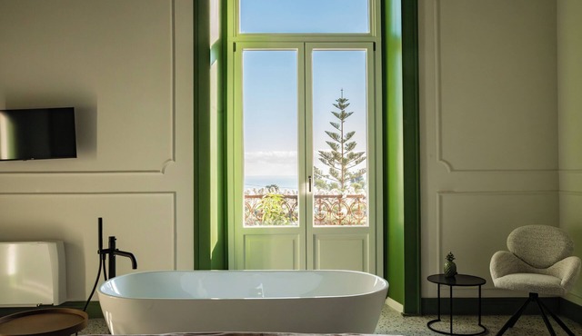 Bright and Elegant Sea-View Room with a Timeless Charm