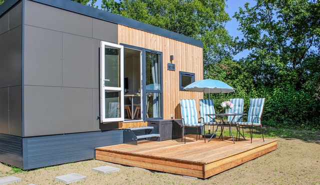 Experience a real Tiny House vacation close to nature at Camping Park Wemding! in Wemding