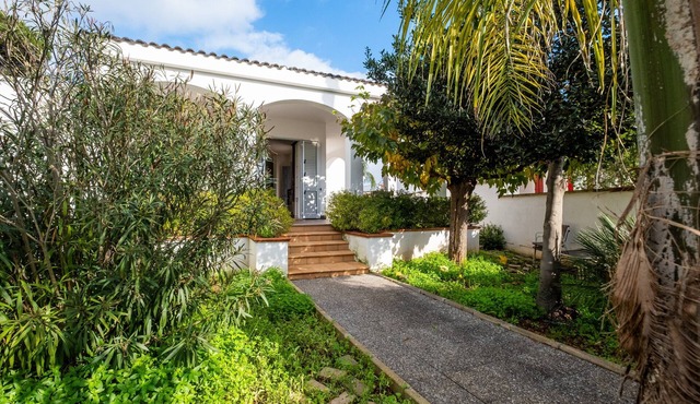 Holiday Home 'Villa Cala Azzurra Porto Cesareo' with Private Garden and Air Conditioning