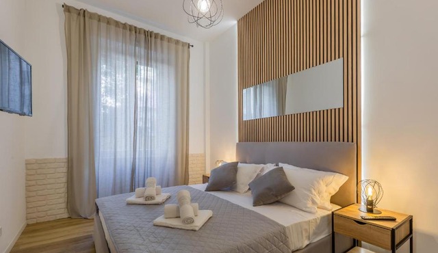 Imperium House - appartamento con giardino privato, 3 minuti da Metro Piazza Bologna, A-C,
