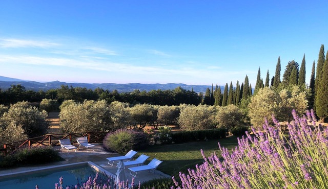 Poggio Corsucci.Historic stone house with swimming pool and enchanting view.