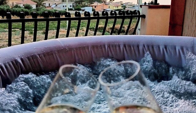 Villa ROSALIA with a Jacuzzi, Barbecue, and Sunset View
