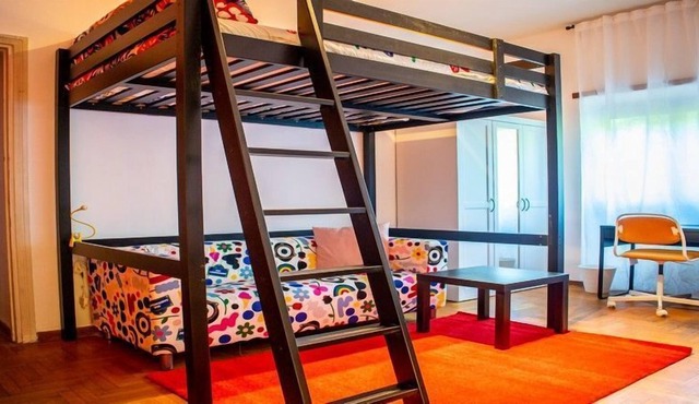KAMCHŪ APARTMENTS VILLA CHIGI: PRIVATE DOUBLE BEDROOM, LOUNGE AREA with SOFA #L2
