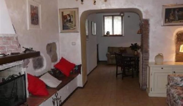 Mansion in medieval town with castle on Bolsena lake