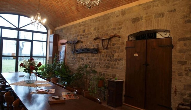 Melissa apartment, with exposed stone walls, inside a farmhouse