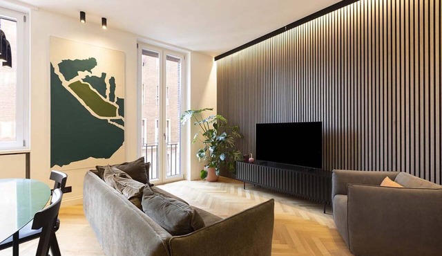 Our apartment is in a building of the past century, it's on the 2nd floor and served by an elevator.You will have at your disposal 2 bedrooms, 2 bathrooms, and a living room, with a cooking area, that will be able to accommodate up to 5 people.The livi