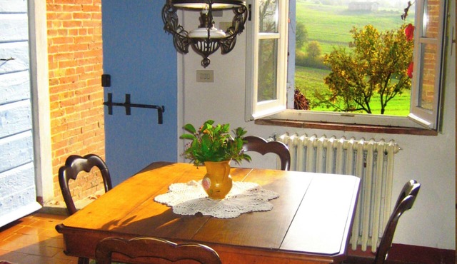 Panoramic apartment in old farmhouse. Farm with historic wine cellar.