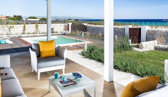 Private villa with sea view on a sandy beach