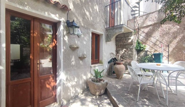 Relaxing in a typical Erice courtyard