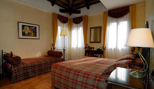 Room 'Villa Goetzen - Camera Tripla' with Wi-Fi and Air Conditioning