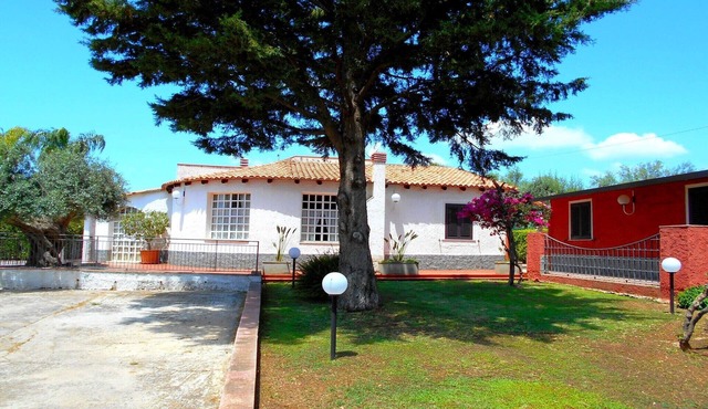Spacious villa with a large veranda and pool