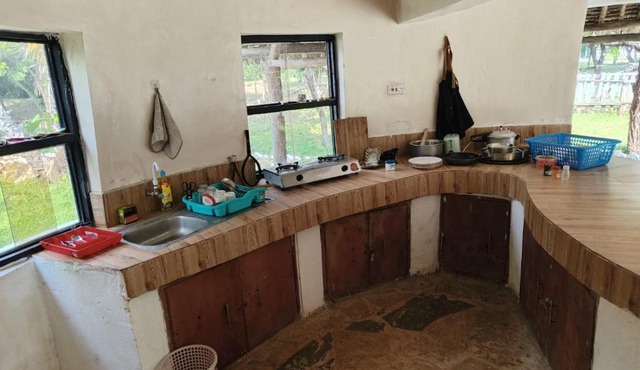 Tiny house, kitchen downstairs in Shimoni