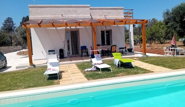Villa in countryside surrounded by olive trees in Puglia, Southern Italy + pool