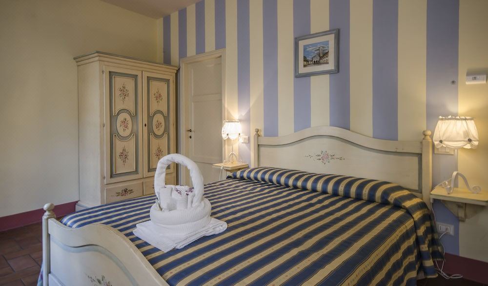 Photo of Bedroom in Lucca Historical Center
