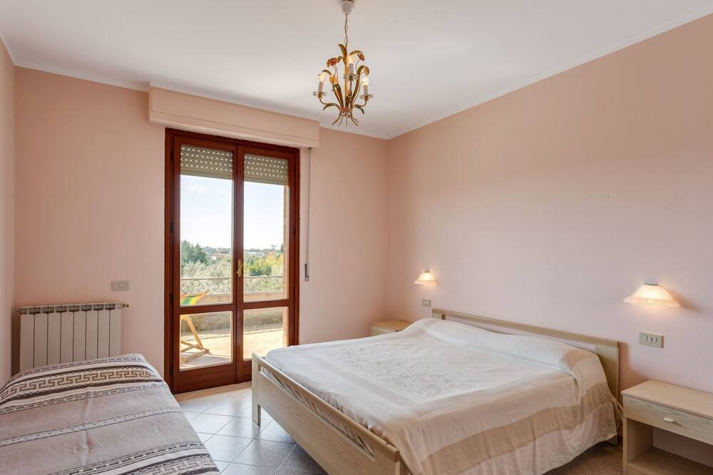 Photo of Bedroom in Tuoro sul Trasimeno