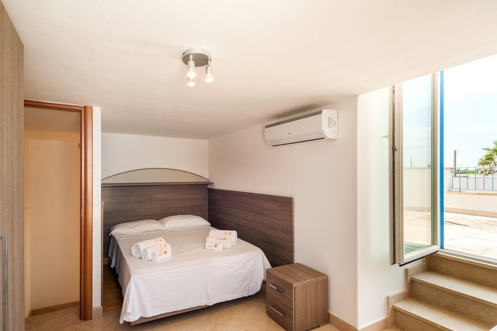 Photo of Bedroom in Posto Rosso