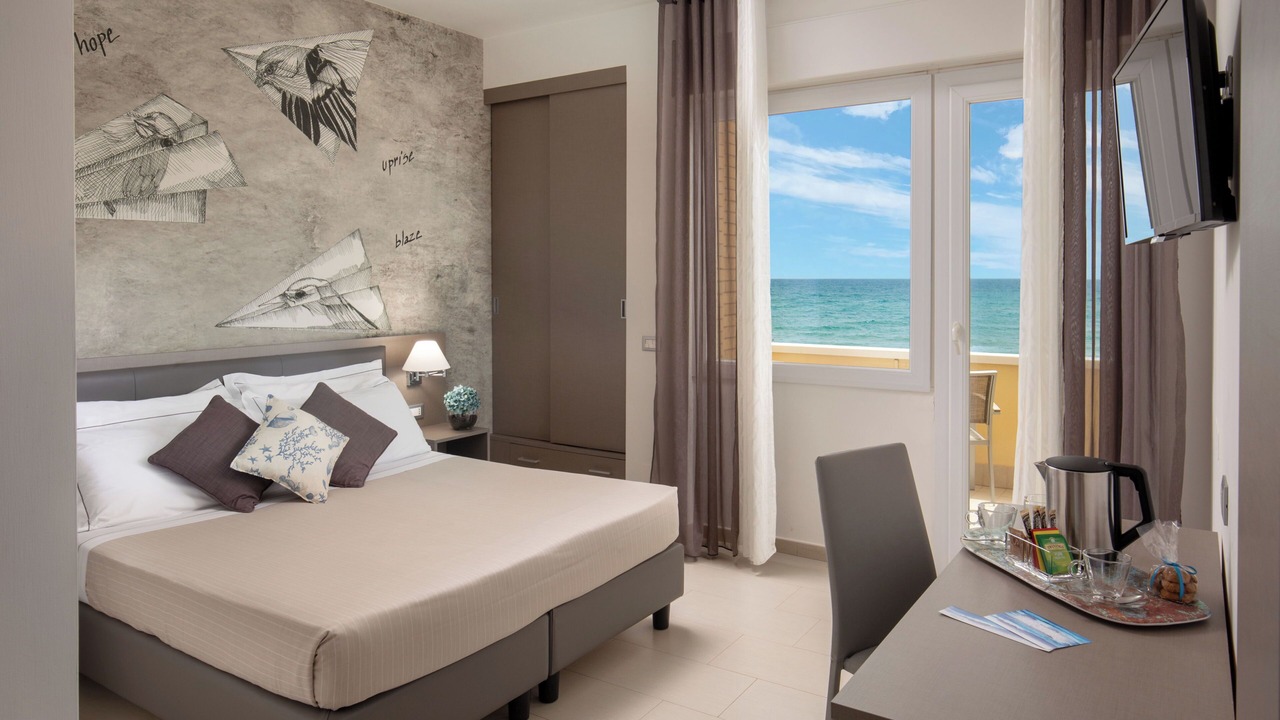 Photo of Bedroom in Lido di Capo Portiere