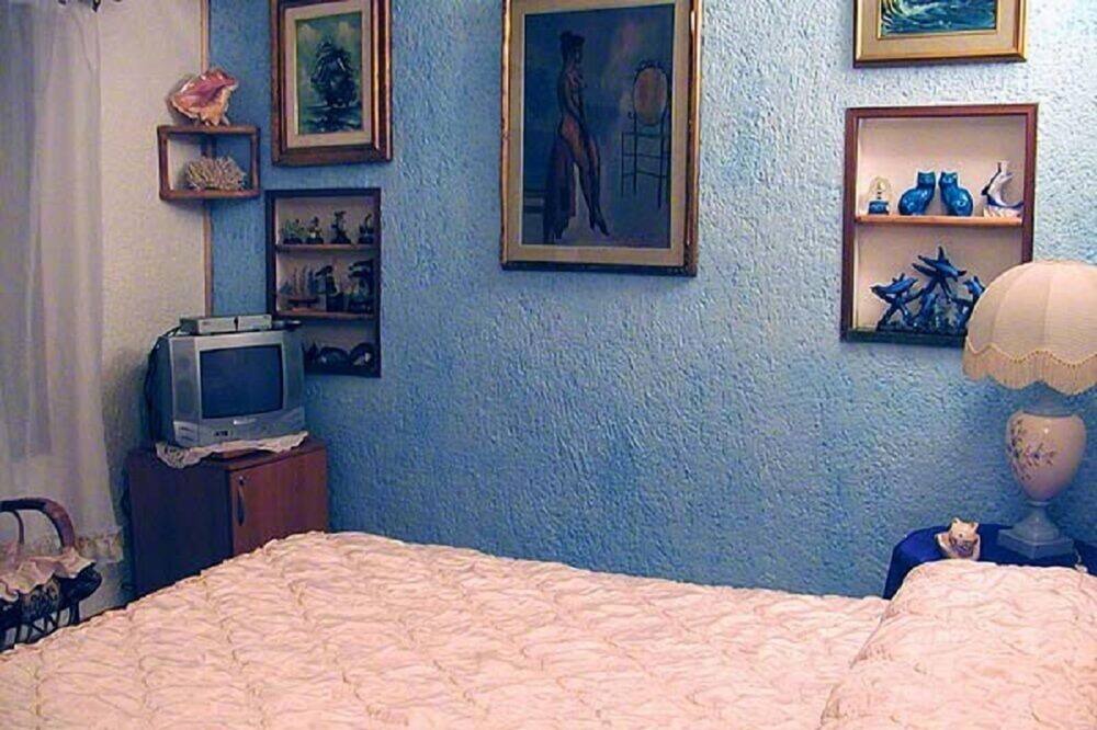 Photo of Bedroom in Cala Piccola